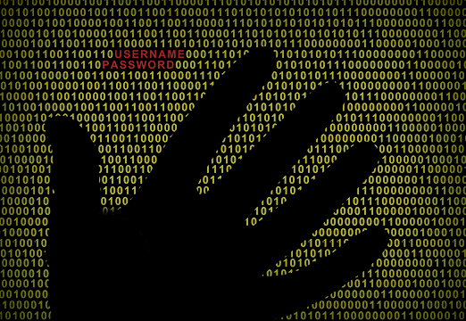 A hand in front of a computer screen with code. In red is username and password.