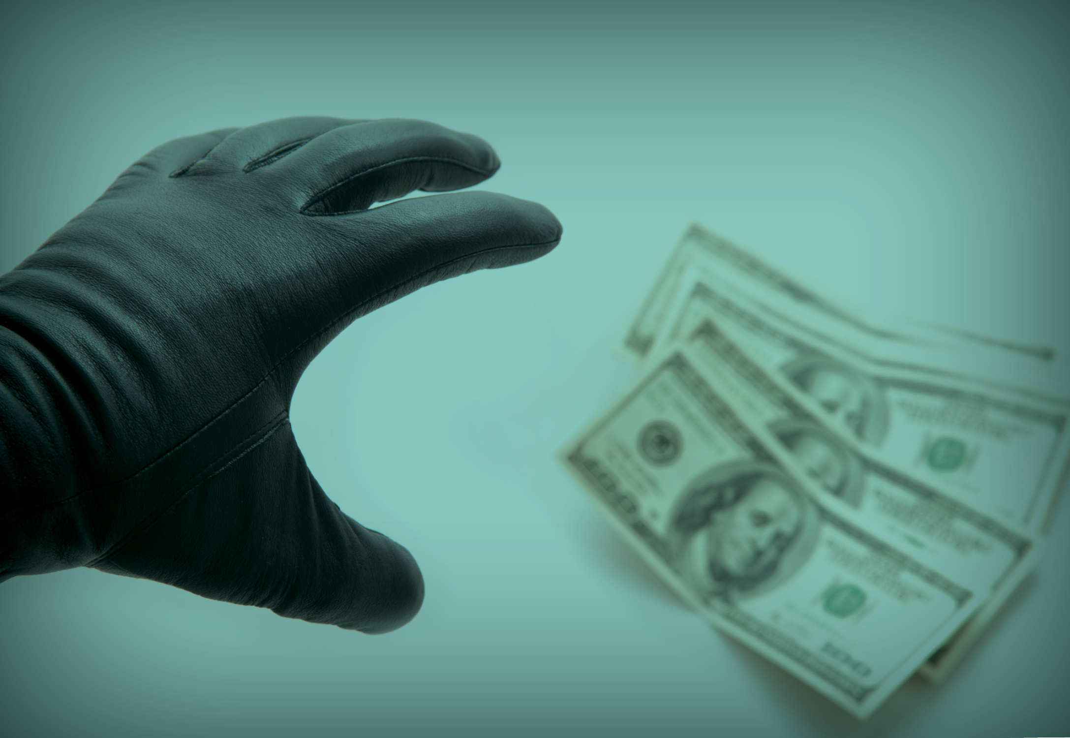 A hand reaching for money and increasing your risk