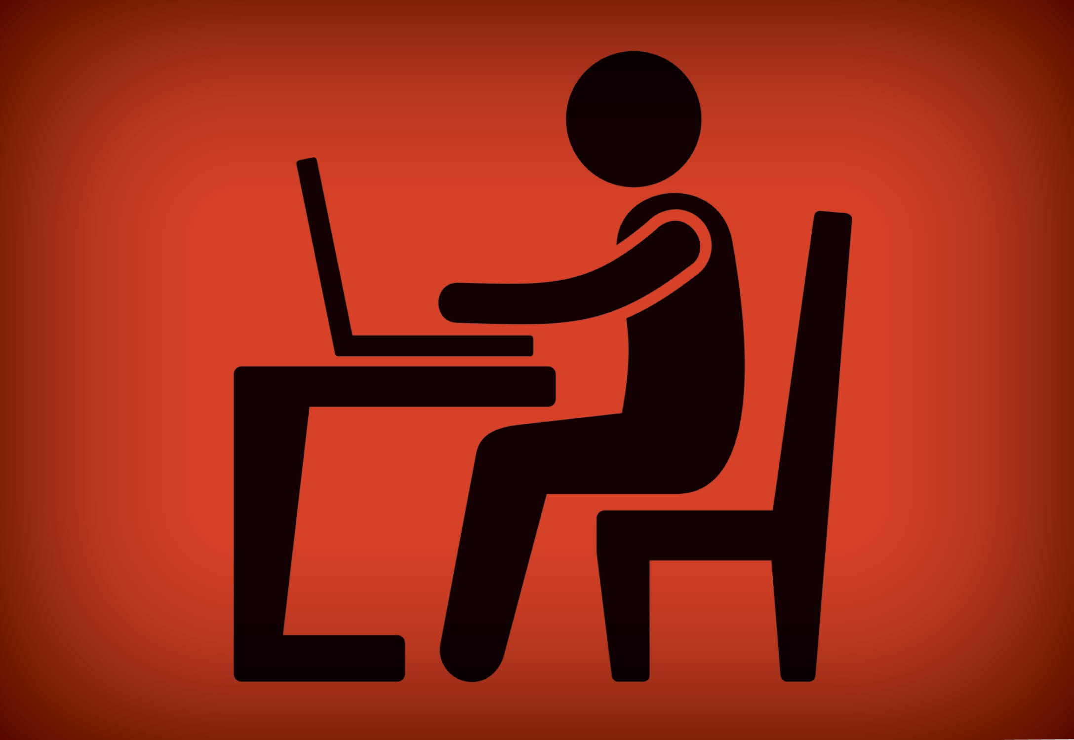 A graphic of an employee sitting at their desk