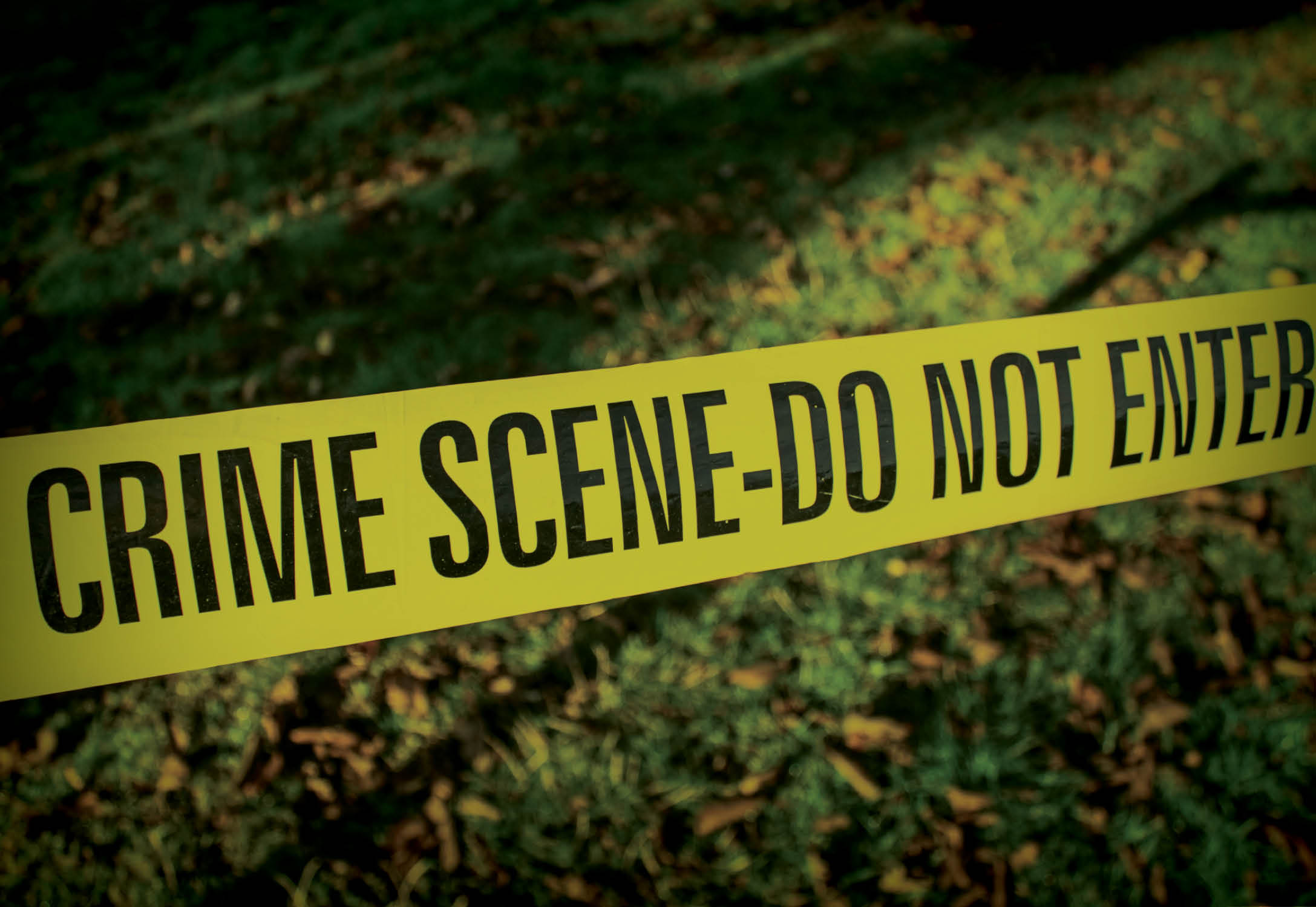 A lawn with caution tape