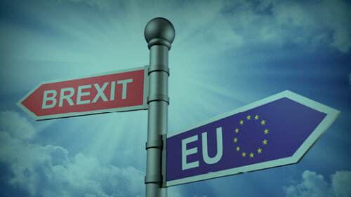 A signpost with EU and Brexit crossroad
