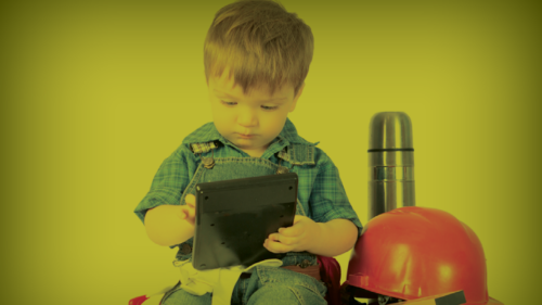 A child pretending to be a construction worker