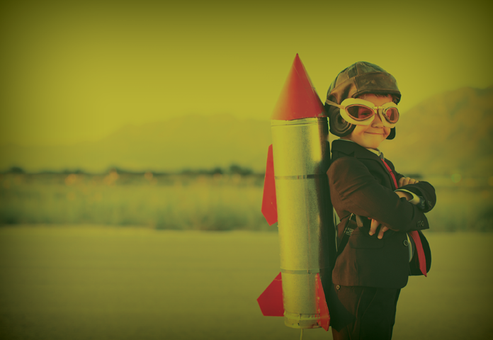 A boy who is ready to succeed with a rocket on his back.