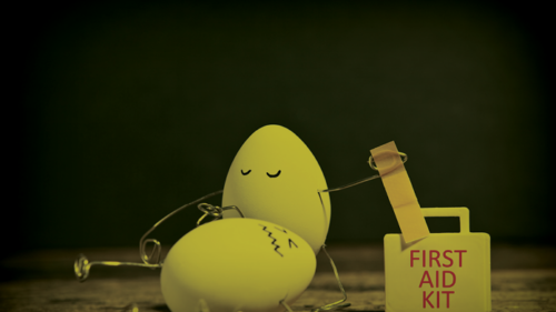 eggs trying to health each other with a first aid kit