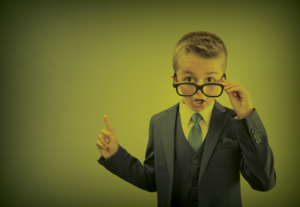 A boy wearing glasses shocked by the cost of insurance