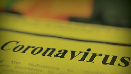 A newspaper with a Coronavirus headline