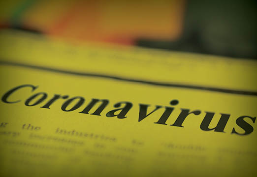 A newspaper with a Coronavirus headline