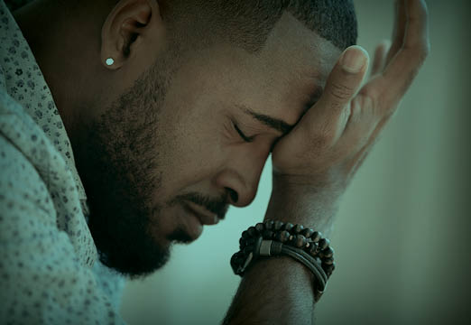 a man struggling with his mental health