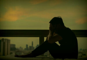 A person contemplating their mental wellbeing