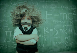 A boy insurance genius dressed as Einstein