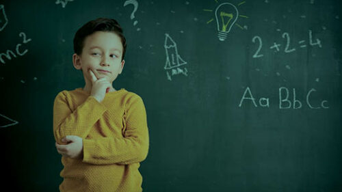 A child thinking with math around them on a blackboard.