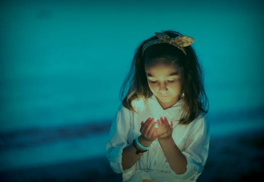 A girl holding hope in her hands