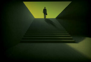 A business man climbing steps