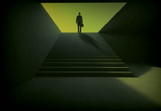 A business man climbing steps