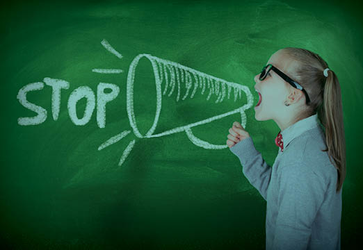 A girl saying Stop