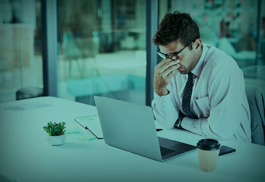 an employee battling burnout