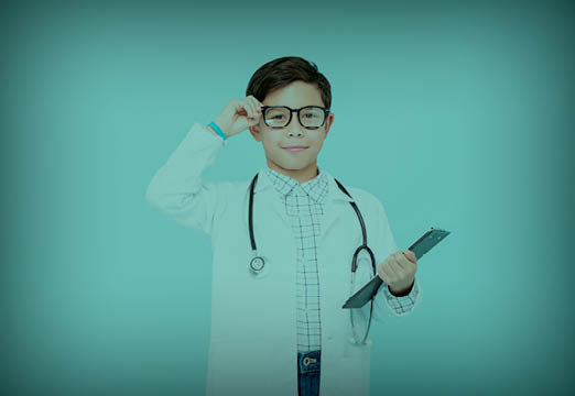Kid dressed up at a doctor
