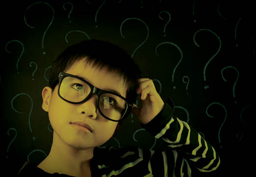 A boy thinking hard