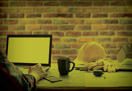 Construction worker at a desk