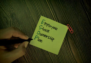 A post it note with ESOP on it