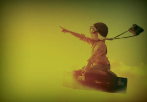 A child playing with a suitcase