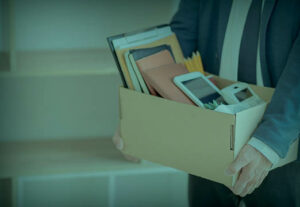 An employee carrying a box