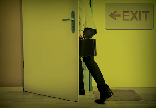 Employee leaving out of exit door