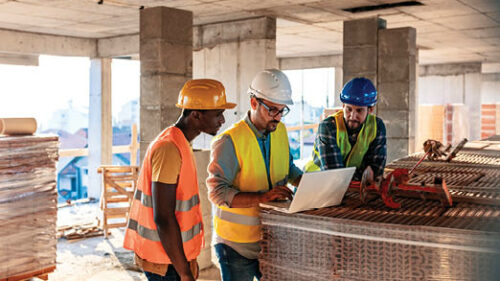 A group of architects and engineers at a jobsite