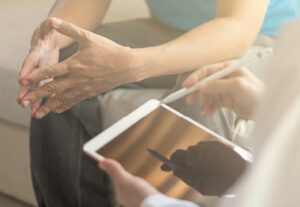 An employee speaking to a therapist