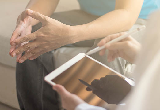 An employee speaking to a therapist