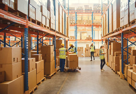 Warehouse with people taking inventory