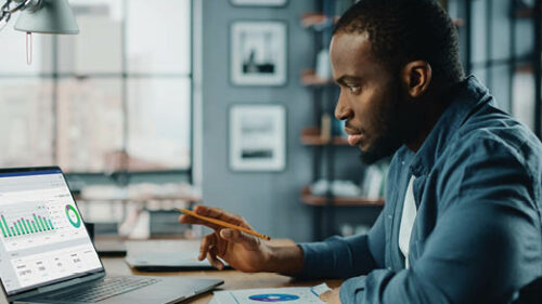 A male employee working from home