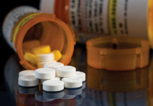 A prescription drug bottle open