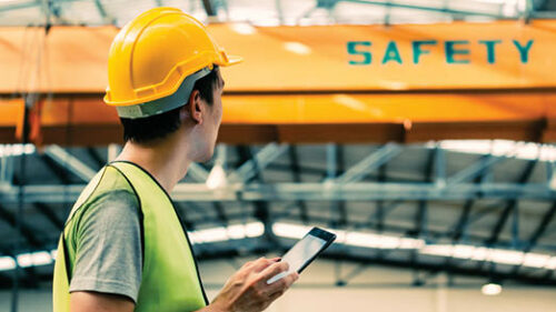 A construction worker in a factory.