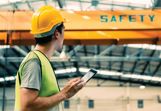 A construction worker in a factory.