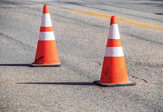 Two traffic cones on a road