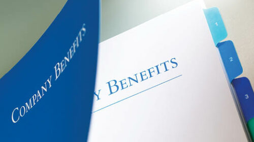 A binder of employee company benefits