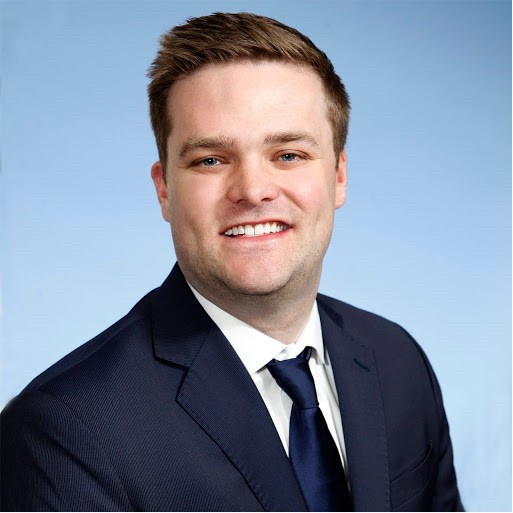 Ted Holt smiling in a professional headshot photo