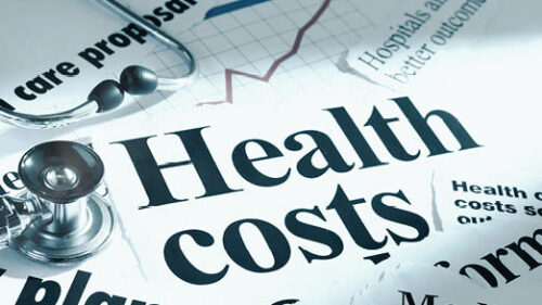 Newspaper clippings of healthcare cost headlines