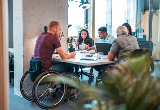 A group of diverse employees working together.