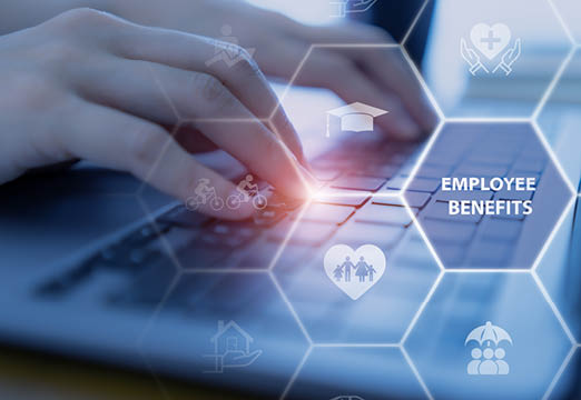 Employee benefits cyber technology symbols with a keyboard.