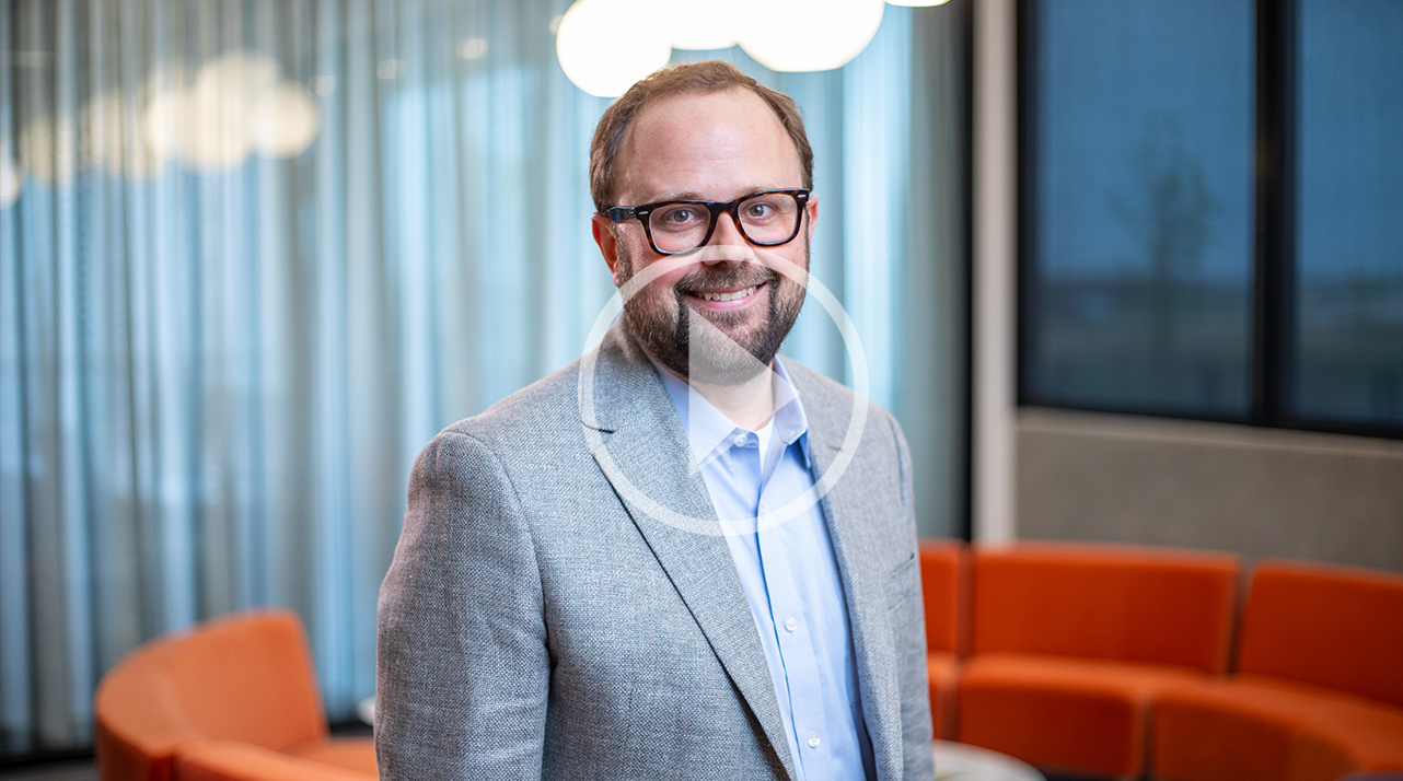 A video thumbnail or Joe Streck, a white man wearing glasses and a light grey suit.