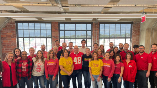 Holmes Murphy Kansas City employees wearing their football team gear during 2023 United Way week.
