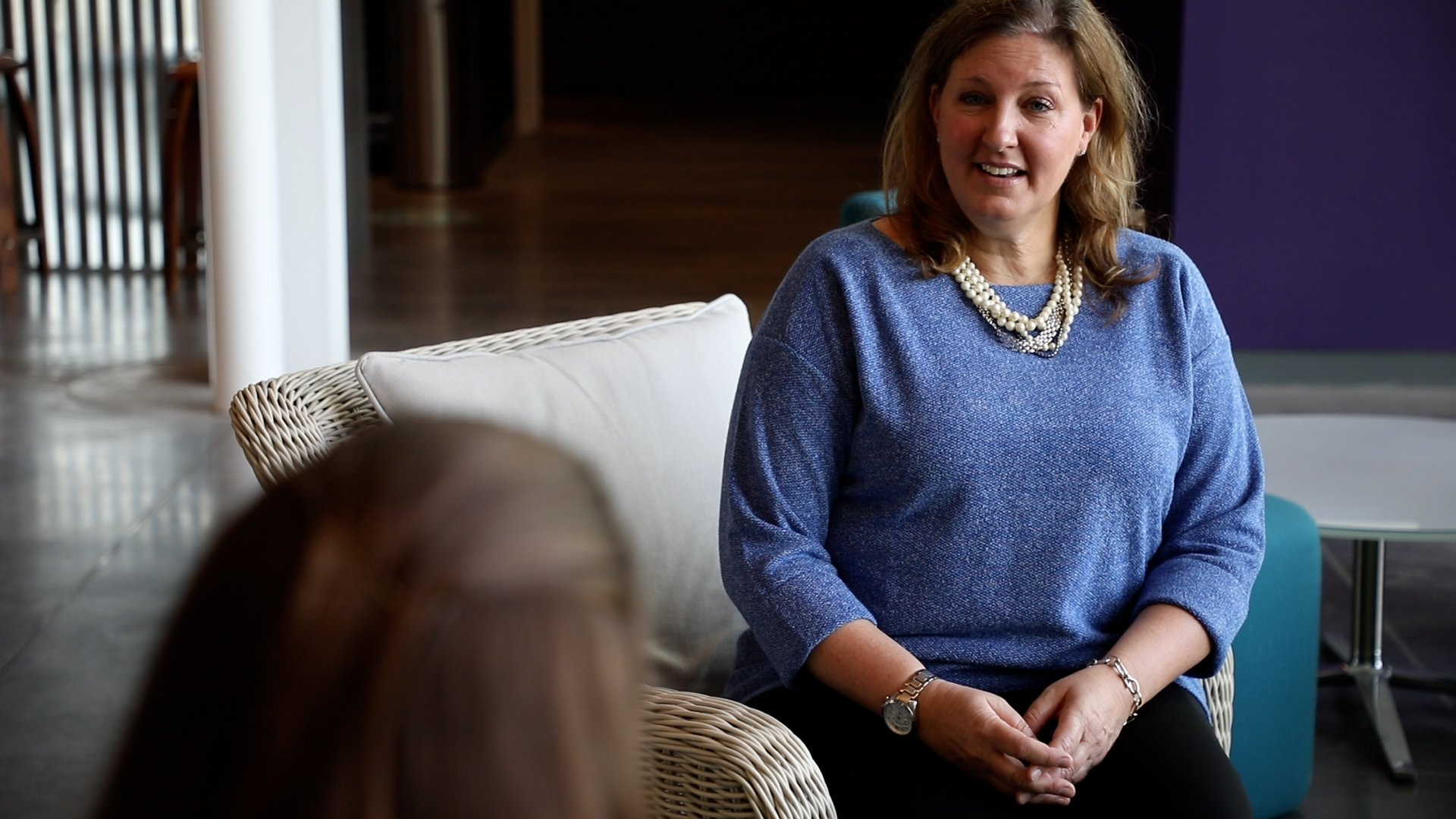 Stephanie Marvelli sitting in conversation.