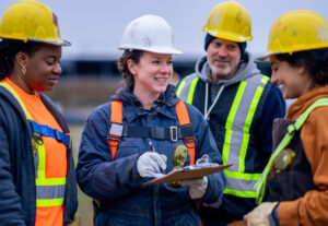 People on a construction site talking.