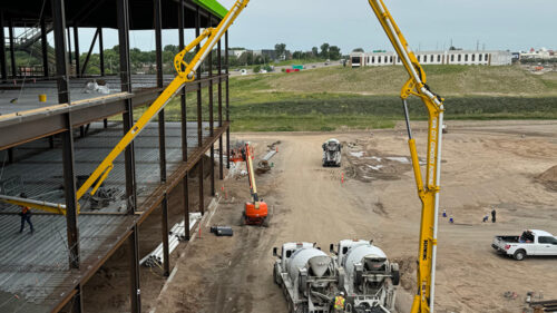 A crane working on a building frame