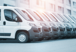 A fleet of company vehicles lined up