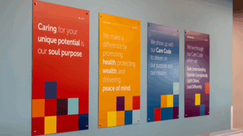 Colorful signs with Holmes Murphy's vision statements