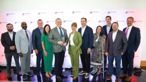 Holmes Murphy employees accept the Greater Des Moines Partnership Economic Impact Award