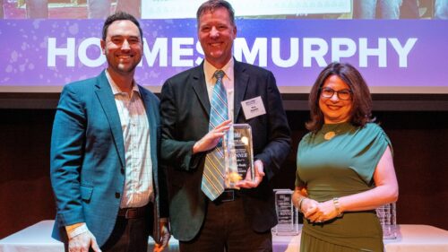 Holmes Murphy team members accept the Partners in Philanthropy Award